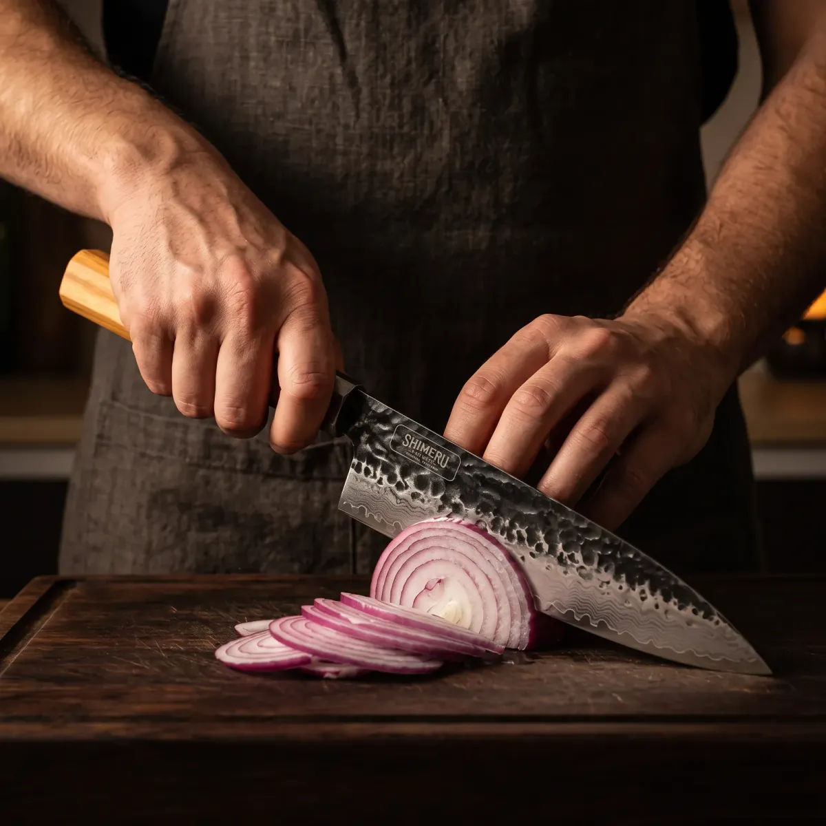 Kakehashi 8" Gyuto slicing a red onion paper thin