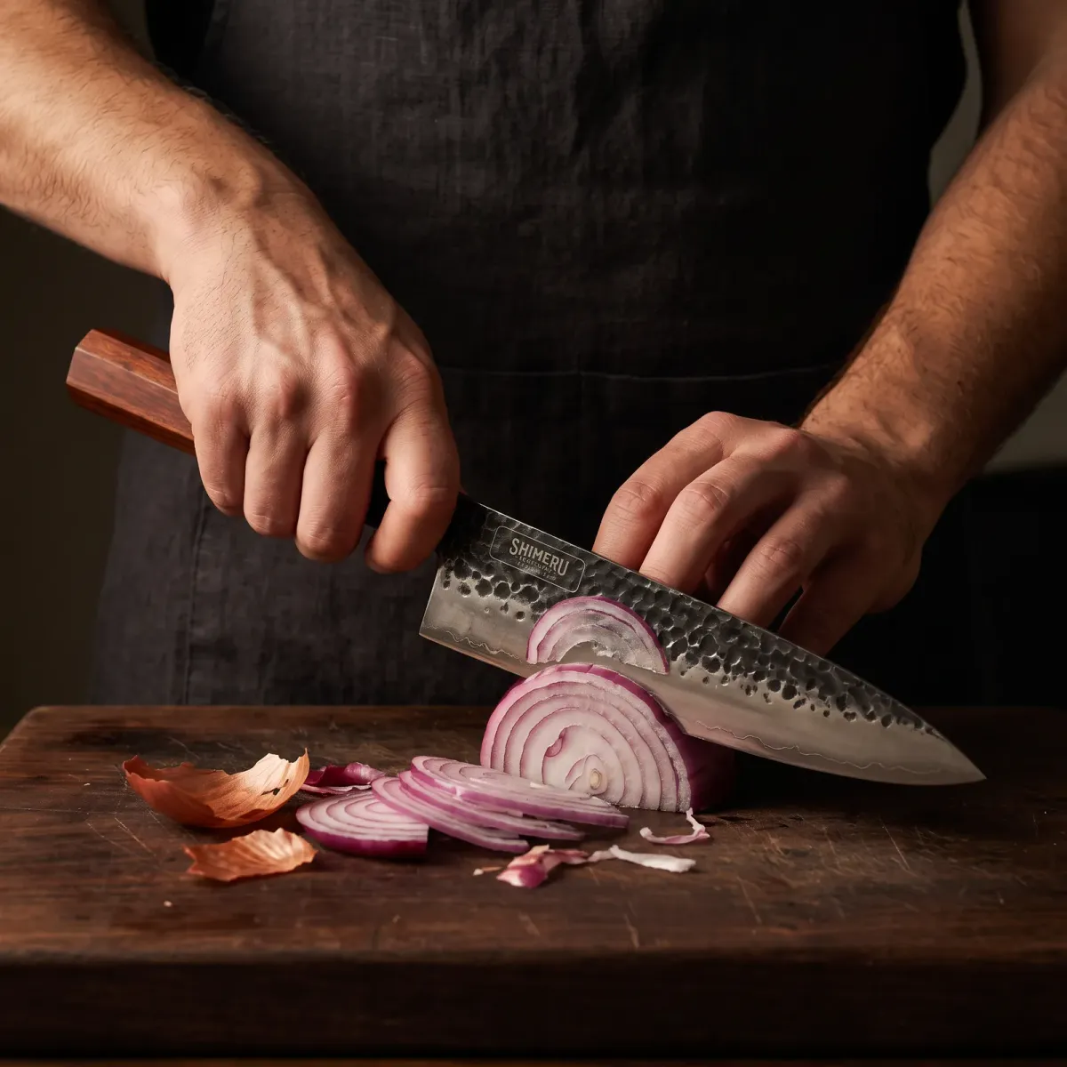 Tenjin 8" Stainless Steel Gyuto Knife slicing a red onion paper thin