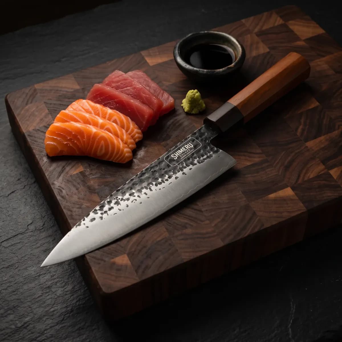 Tokachi 8.5" Gyuto Chef Knife beside sliced salmon and tuna sashimi