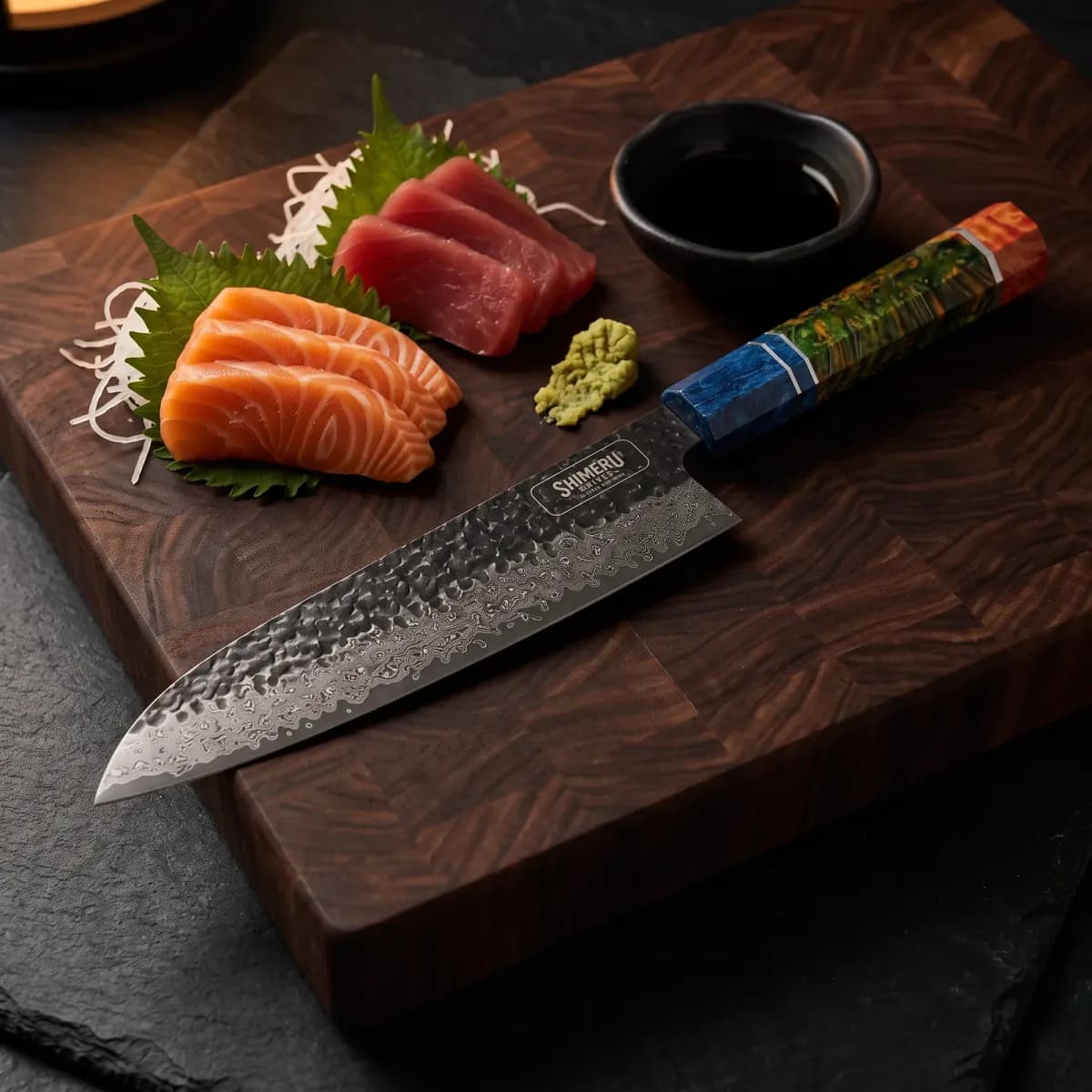 Yoshii 8 Damascus Steel Gyuto Knife beside sliced salmon and tuna sashimi