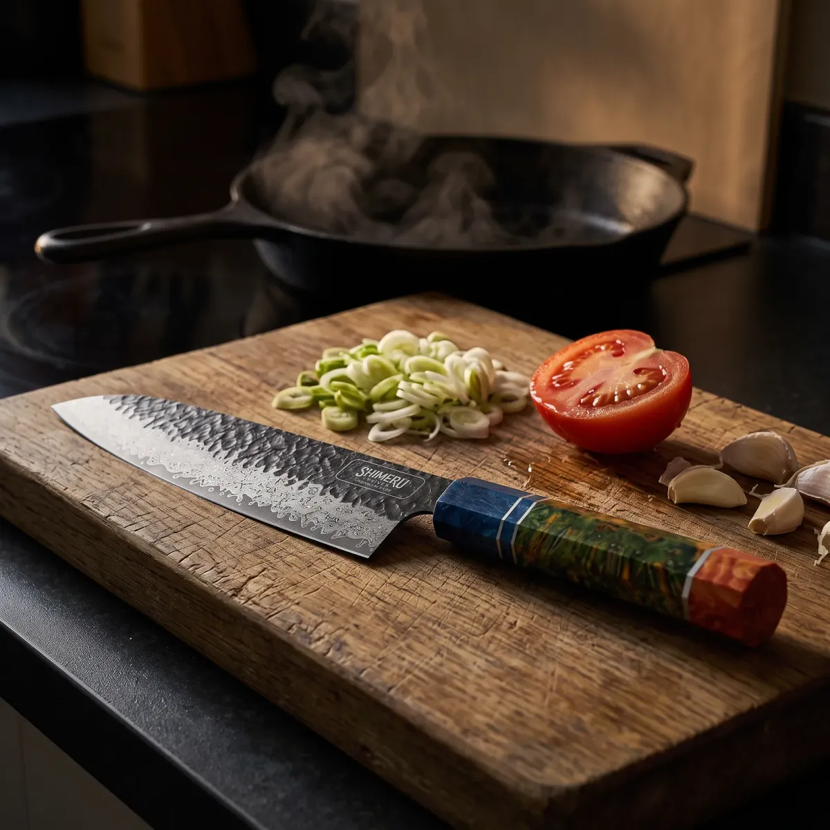 Yoshii 8 Damascus Steel Gyuto Knife on an oak board with spring onions, tomato and garlic