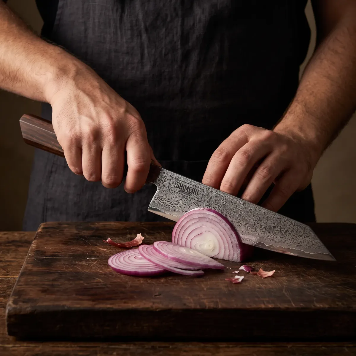 Tenryu 8" Damascus Steel Kiritsuke Knife slicing a red onion paper thin