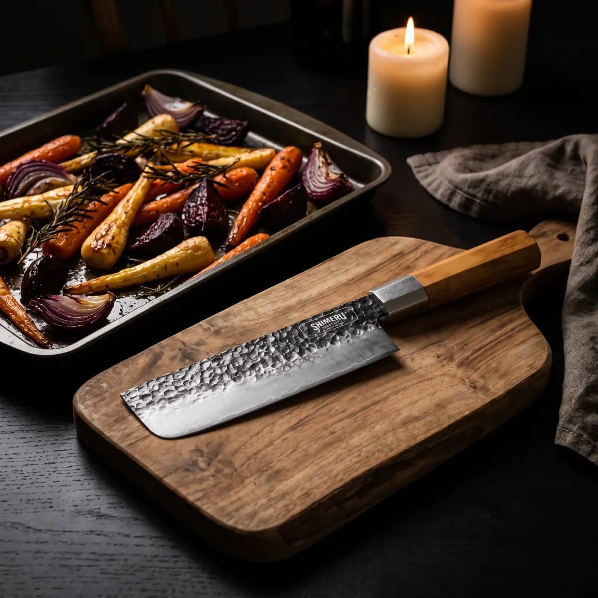 Chitose 7" Nakiri Knife beside a tray of roasted root vegetables